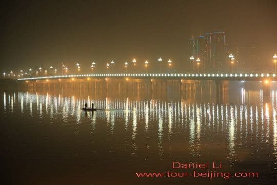 The brightly lit Qingyi River Bridge