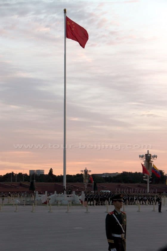 A fully raised national flag.