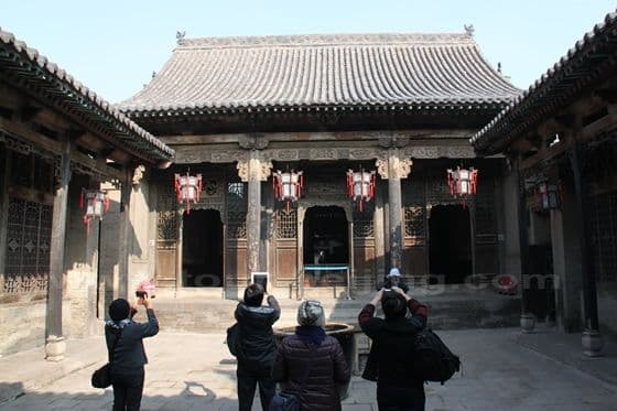 A typical Chinese courtyard building with fine and exquisite wood and stone carvings.
