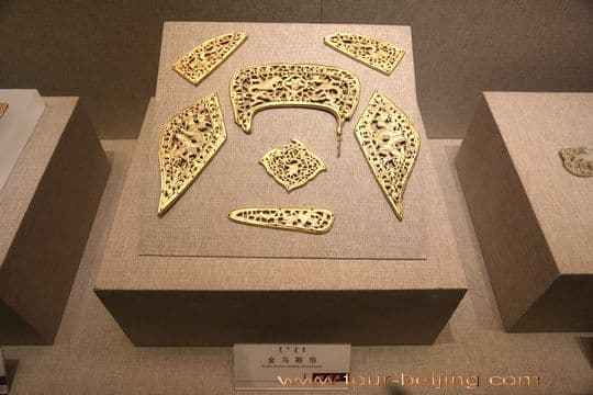 The gold saddles on display.
