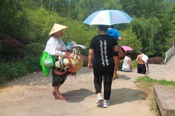 Local villagers are selling sun hats and fish baits