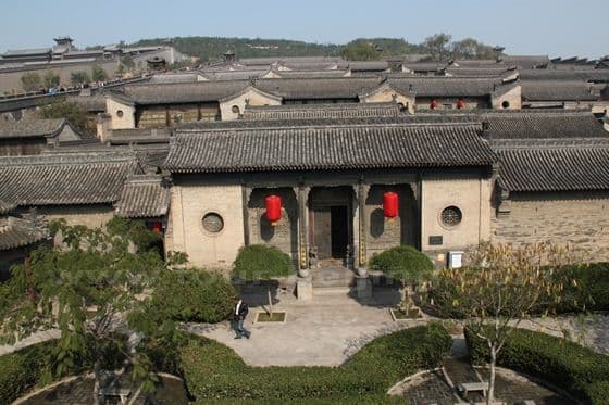 Rows of courtyard houses cascade from the hills.
