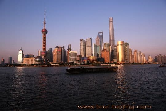 The snowy West Lake under sunset glow