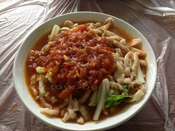 This restaurant makes a very delicious noodles known as Baopi Noodle , mixed flour with wheat and sorghum.