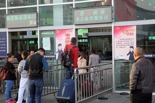 Line up for ticket and security check