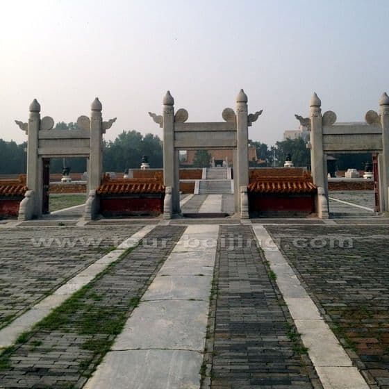 peep through the wooden gate and take a picture of the Altar from a distance.