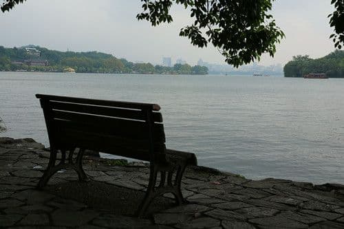 take a seat on the benches arrayed along both sides of the dam