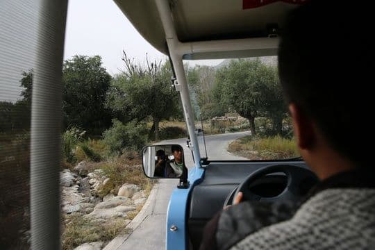 take an electric car going from the rock art museum to the site