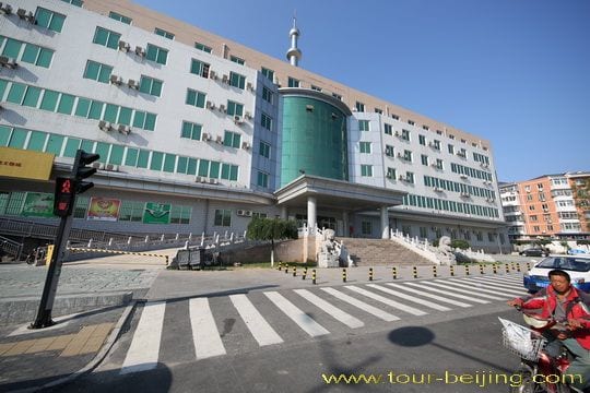 You get off the 15th stop pf Beidajie ( North Street ) by the side of the large governmental building.